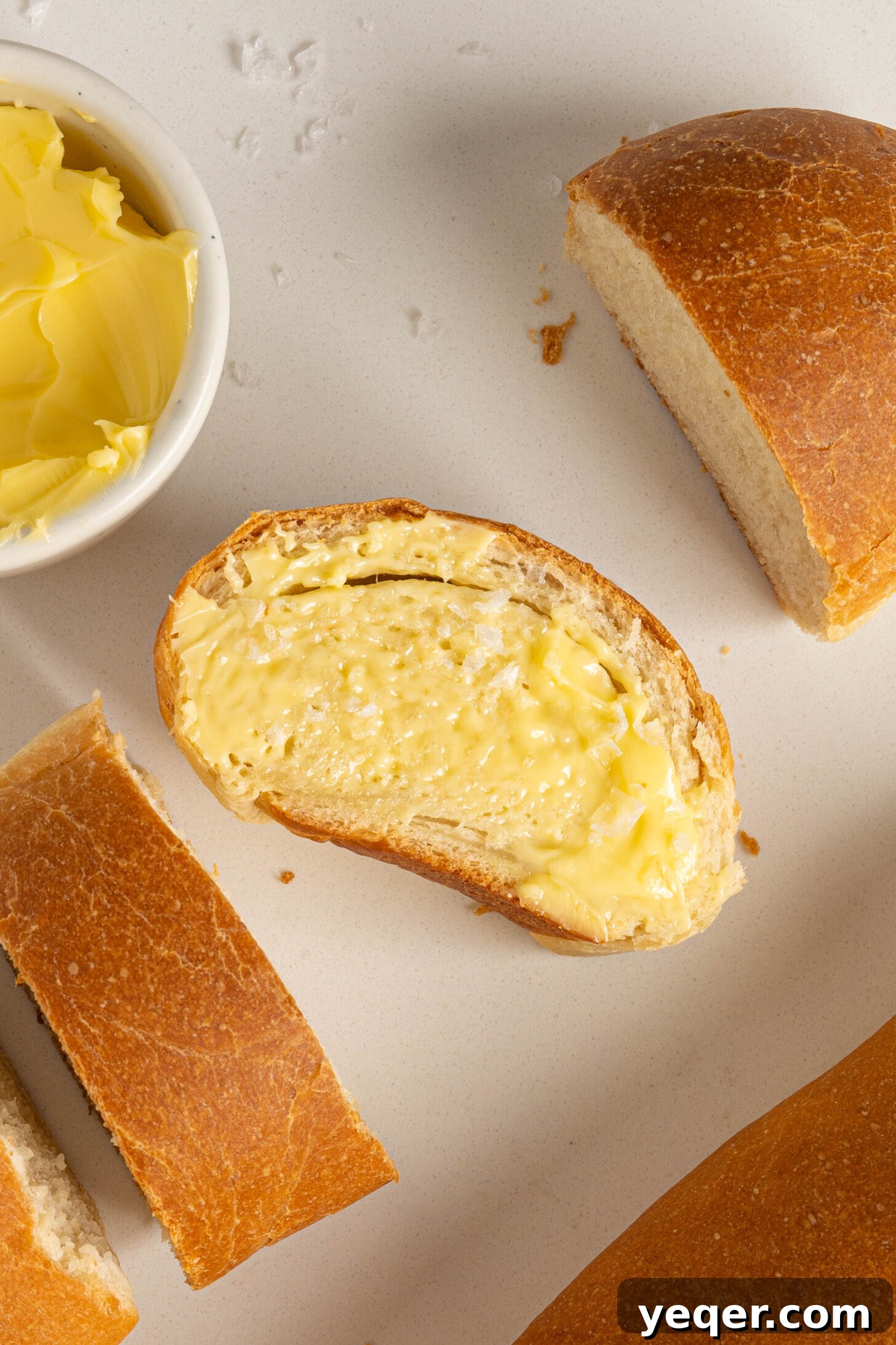 Pan Sobao Puerto Rican Soft Sweet Bread 3 Two plates with sliced pan sobao, highlighting its golden crust and airy interior.