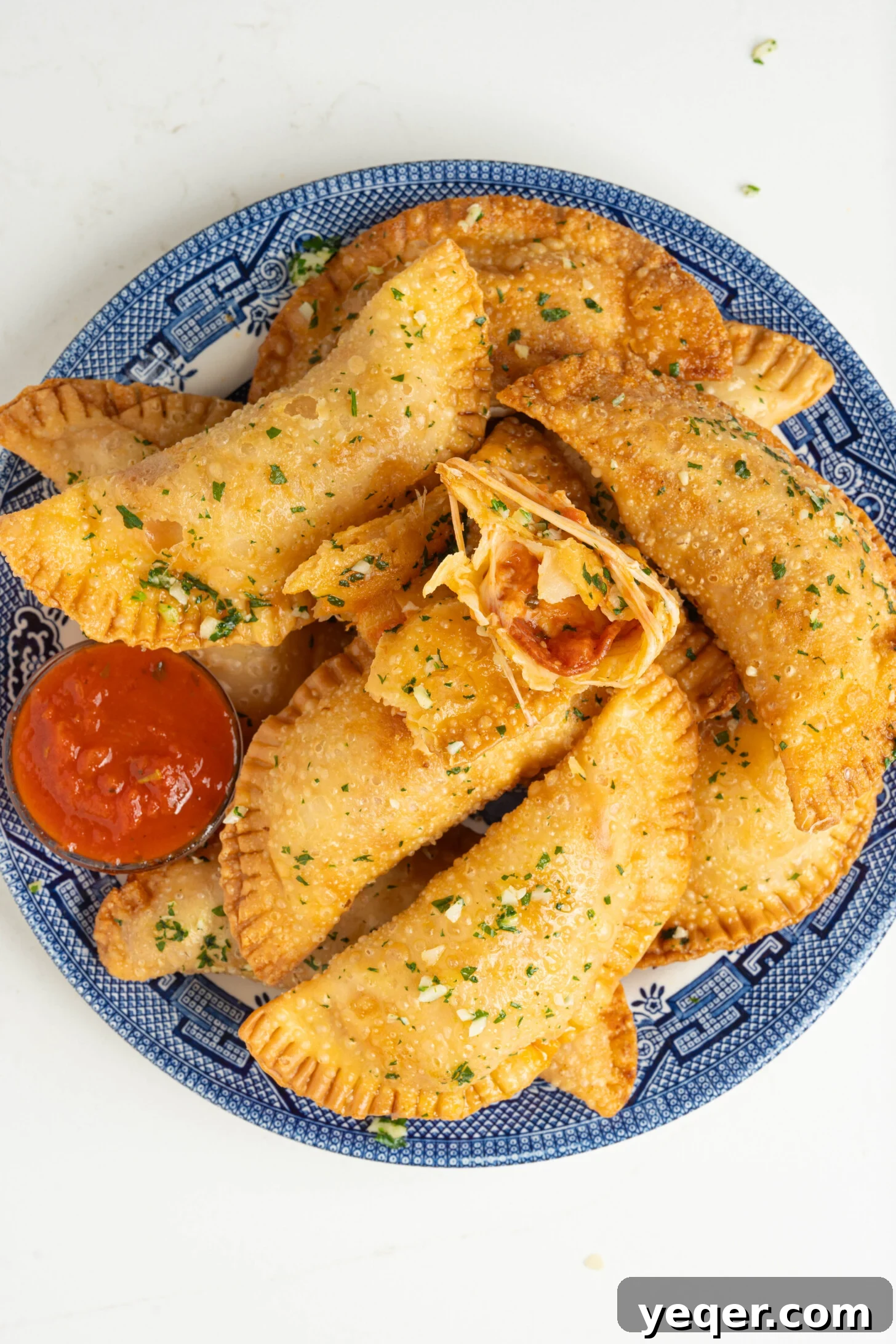Quick Pizza Pockets 8 A vibrant plate of Pizza Empanadas, perfectly cooked and ready to eat.