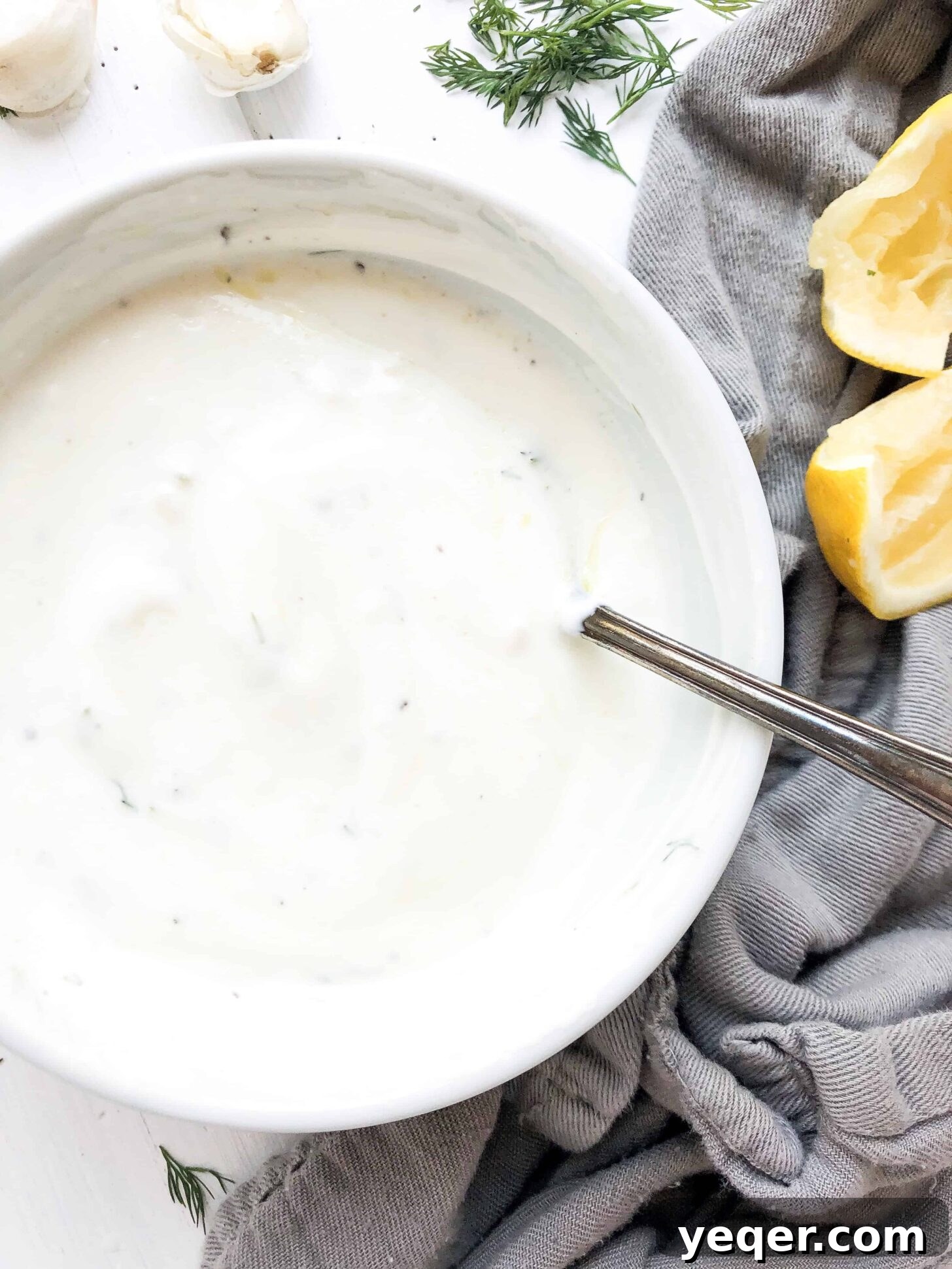 Refreshing Dill Tzatziki 4 A beautifully presented bowl of Greek-inspired Tzatziki sauce, ready to be served.