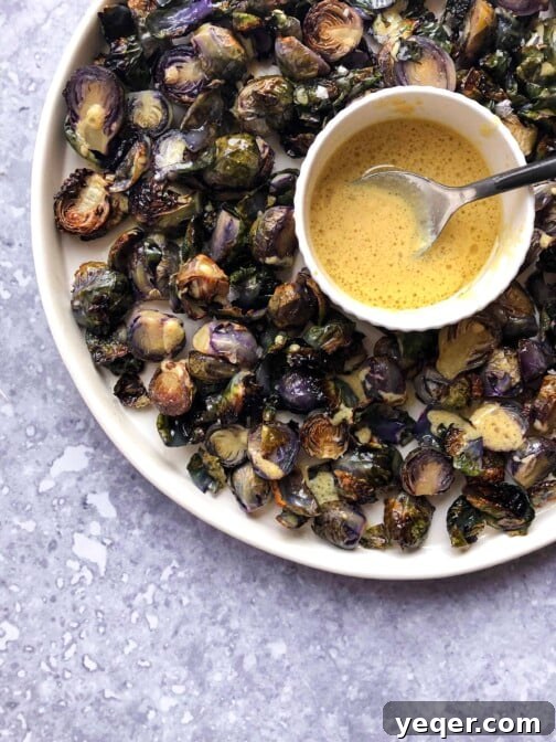 Lemon dijon brussels sprouts with a lemon sauce.