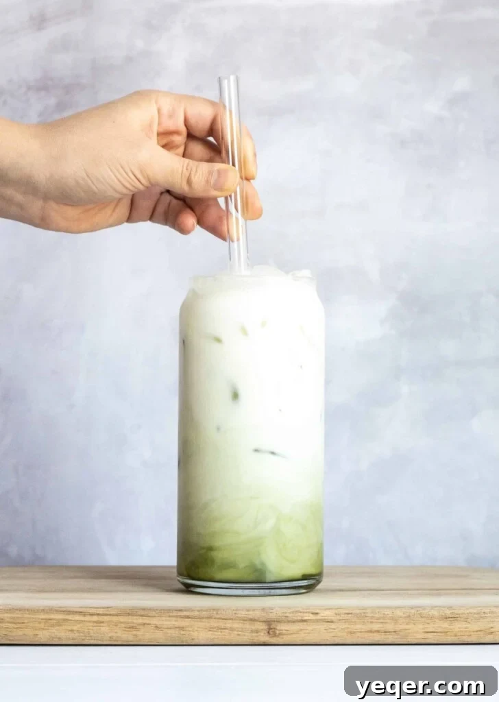 Effortless 4-Ingredient Matcha Lattes, Whisk-Free 9 Another enticing view of an iced matcha latte, highlighting its creamy texture.