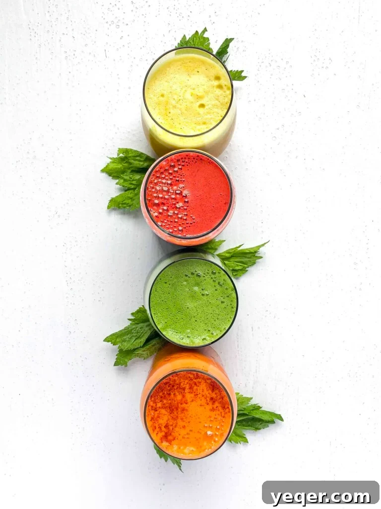 Portland Food Photography: Behind the Stellar Juices Lens 2 A vibrant quartet of freshly squeezed juices, showcasing the natural colors of fruits and vegetables.