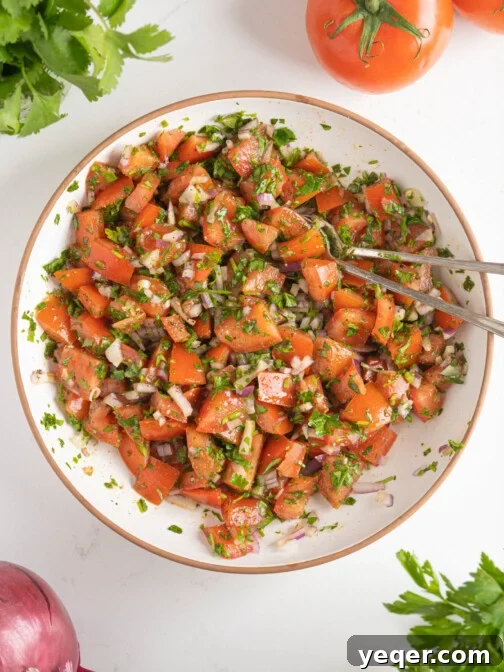 A Moroccan tomato salad in a bowl, a classic side dish.