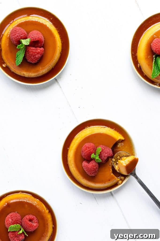Salty Sweet Symphony: Puerto Rican Coconut Flan 3 Puerto Rican Salted Coconut Flan on small plates with raspberries.