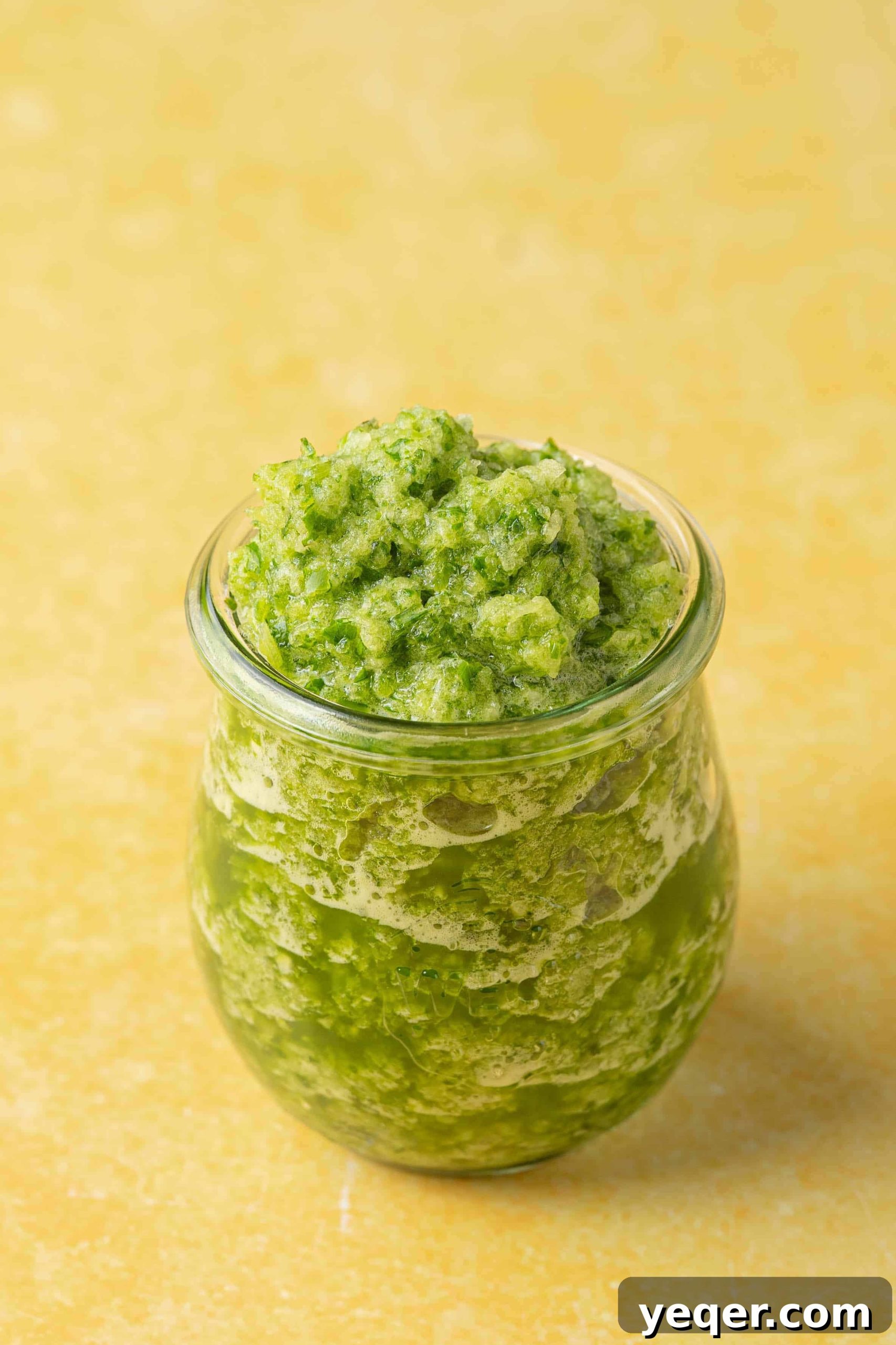 Vibrant Homemade Puerto Rican Sofrito 9 A large jar of freshly made sofrito, ready for use in a variety of dishes.