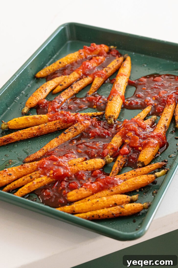 Harissa-Honey Roasted Carrots, Creamy Garlic Yogurt 4 Roasted carrots topped with a harissa honey glaze.