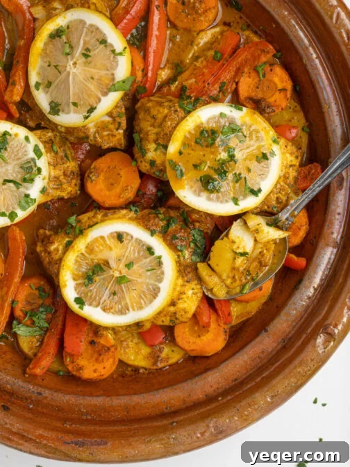 A pot of Moroccan fish stew, rich with spices and fresh ingredients.
