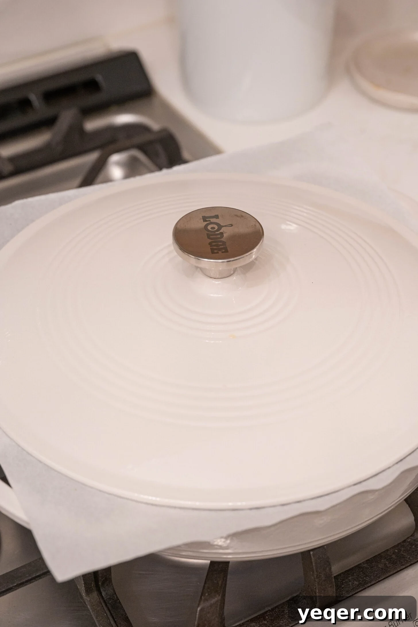 Moroccan Fish and Potato Tagine 9 A Dutch oven with a neatly placed parchment paper cartouche under the lid, demonstrating the technique.