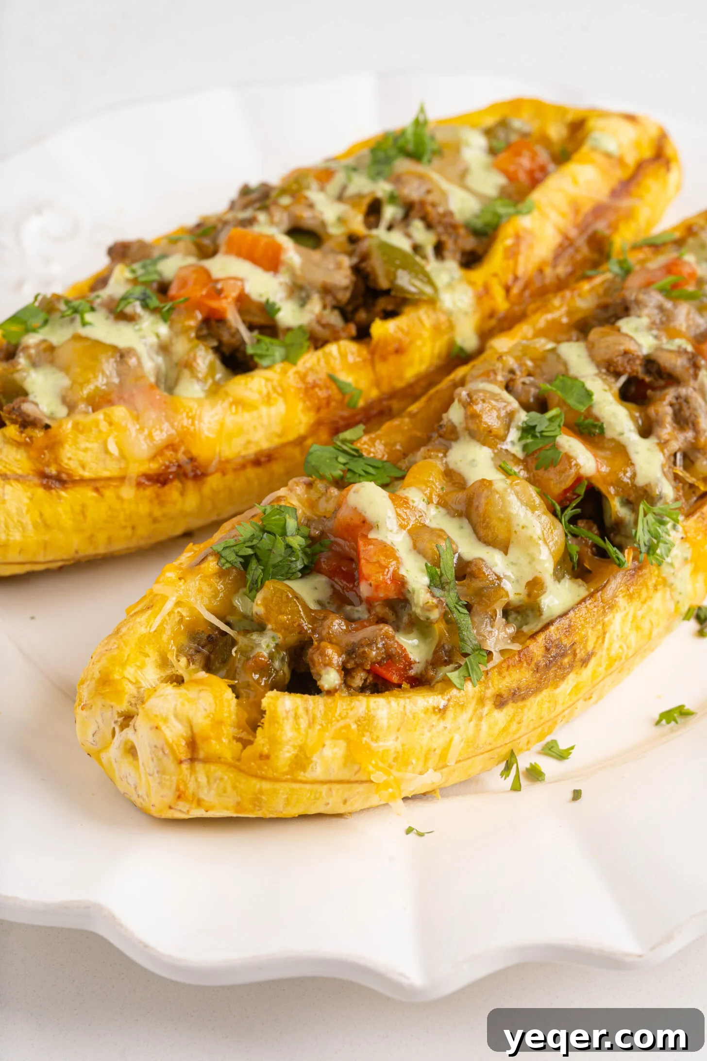 Puerto Rican Canoas Sweet Stuffed Plantain Delights 9 A close-up shot of a single Canoa de Platanos Maduros, showing its cheesy, savory filling.