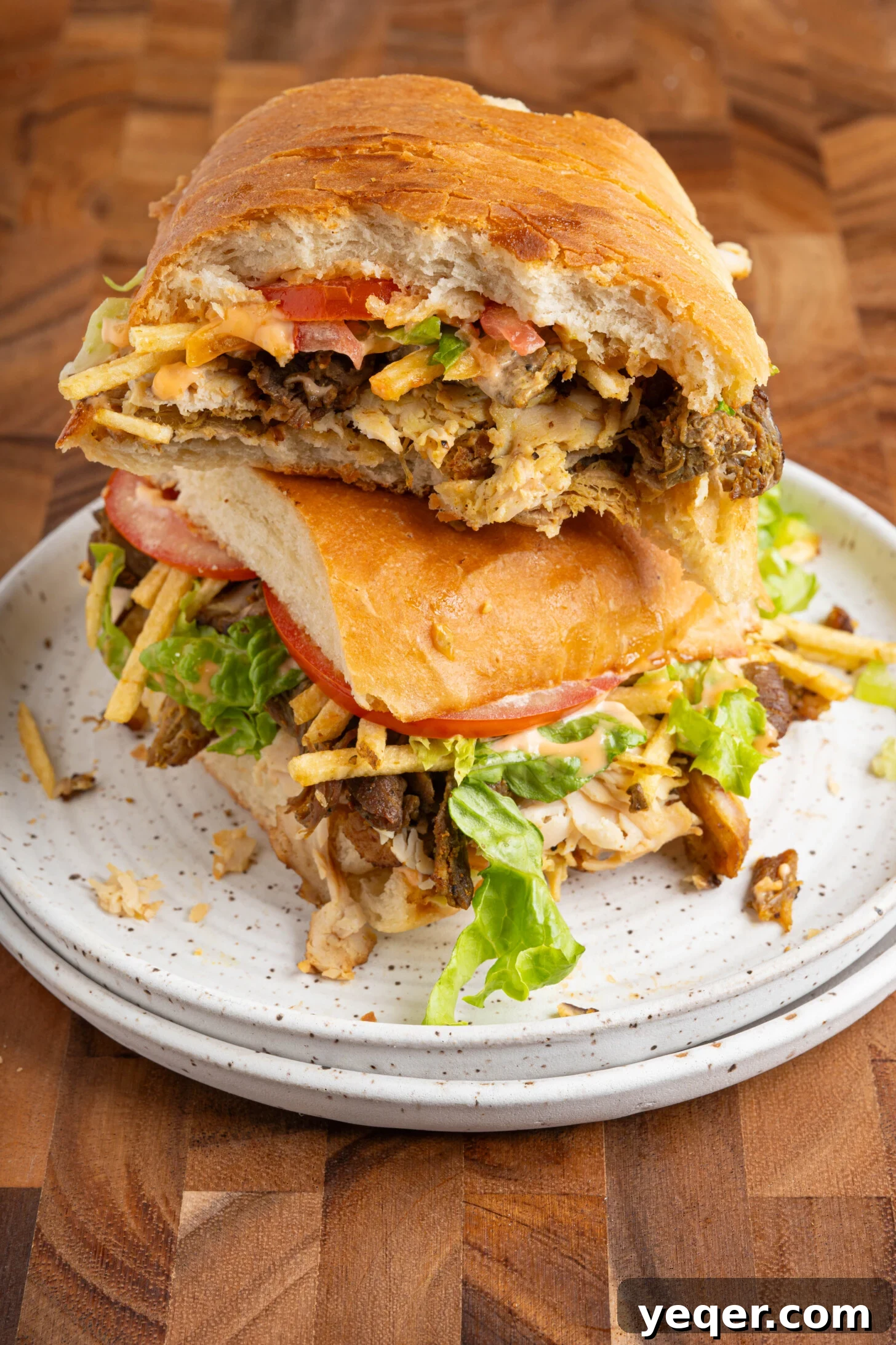 Tripleta: Puerto Rican Three-Meat Sandwich Recipe and Guide 2 A tripleta sandwich on a plate.