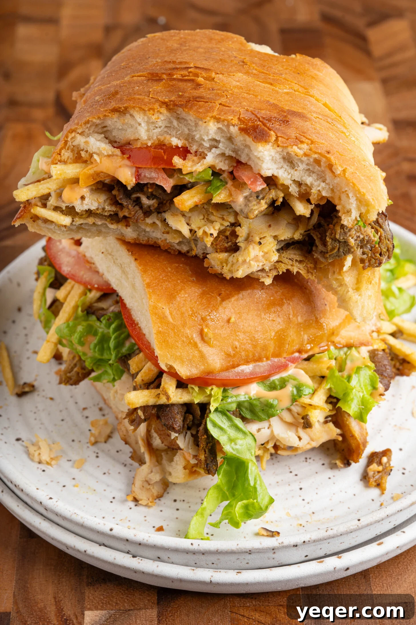 Tripleta: Puerto Rican Three-Meat Sandwich Recipe and Guide 13 A tripleta sandwich on a plate.