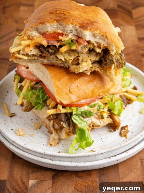 A tripleta sandwich on a plate.