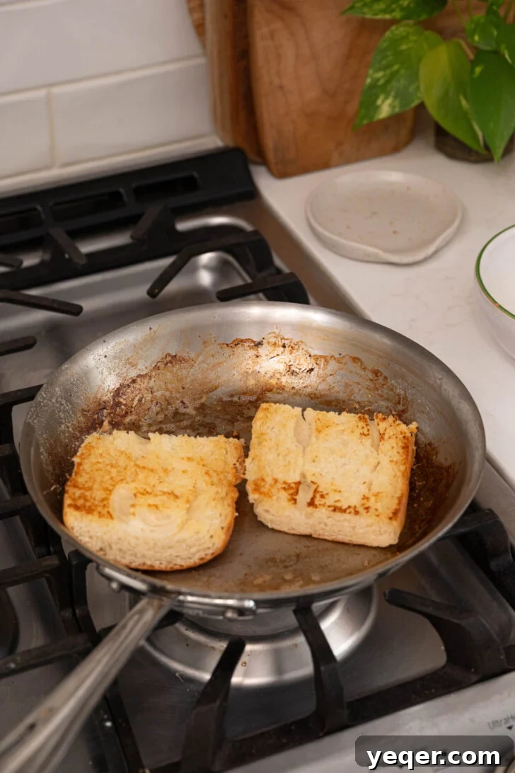 Tripleta: Puerto Rican Three-Meat Sandwich Recipe and Guide 5 Toasted pan sobao in a pan.